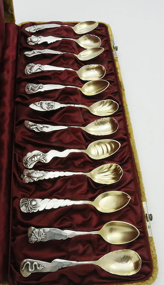 twelve Shiebler applied sterling silver spoons in box