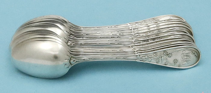 Twelve Tiffany sterling coffee spoons