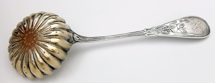 reverse of Tiffany sterling sifter spoon