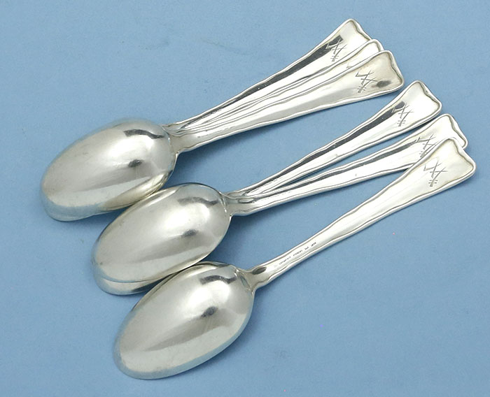reverse of Tiffany lap over edge dessert spoons
