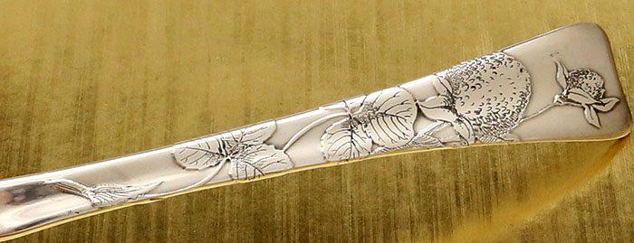 detail of Tiffany acid etched  antique sterling serving spoon