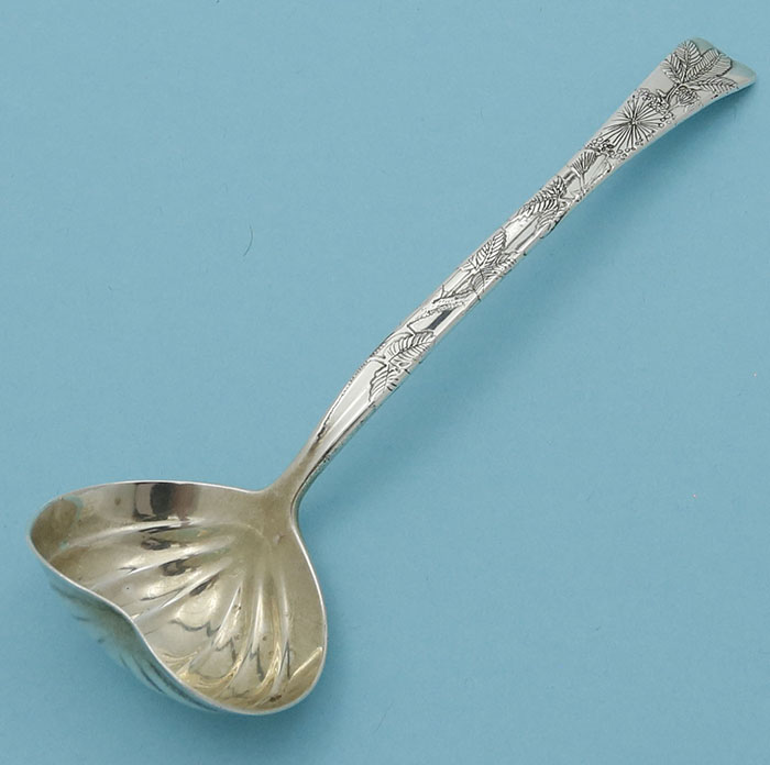 Tiffany antique sterling silver ladle with acid etched detail in lap over edge pattern