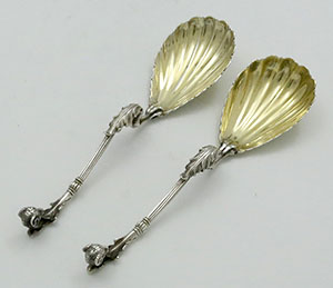 pair of Moore for Tiffany sterling antique silver spoons with ram's heads