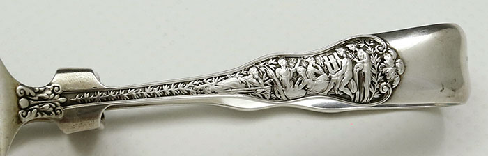 detail of the handle Tiffany Olympian asparagus tongs