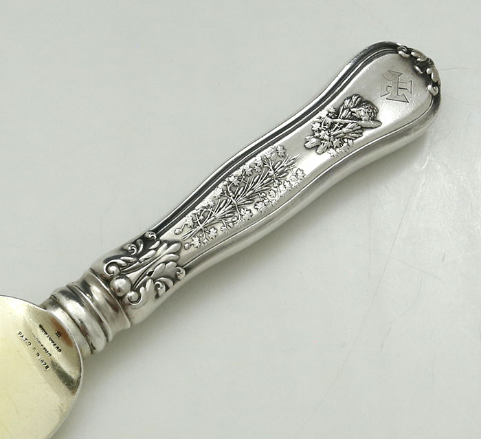 handle of Tiffany Olympian ice cream knife