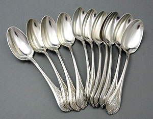 twelve Wendt Florentine dessert oval soup spoons sterling silver