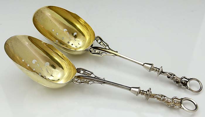 pair of antique sterling Wood & Hughes ice scoops pierced circa 1875